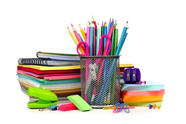 Photo of Group of colorful school supplies isolated on white