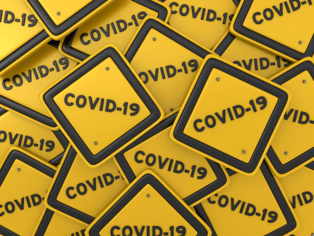 istock COVID-19 Road Sign - 3D Rendering 1213578148