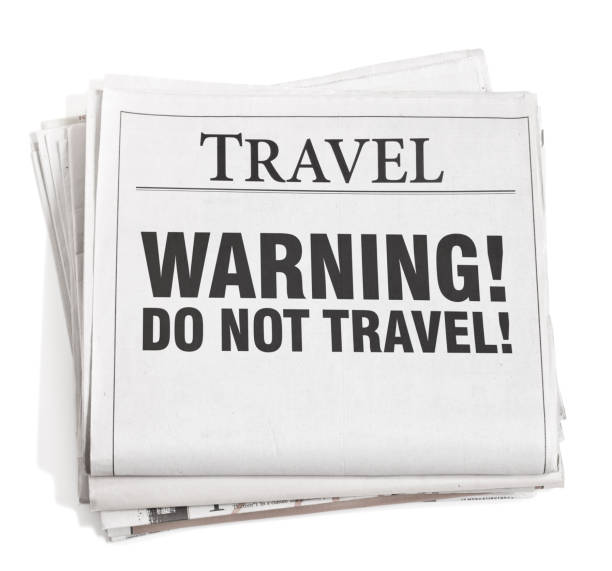 istock Newspaper Headline Travel Warning 1213579106