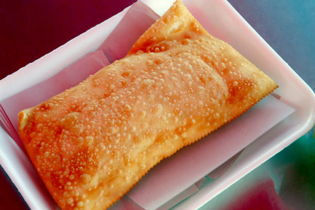 Traditional pastry called pastel in portuguese sold on street market in Sao Paulo, Brazil
