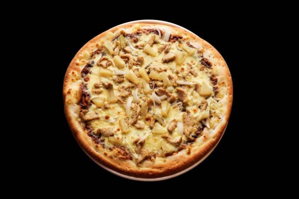 istock Hawaiian pizza - pineapple pizza close up 1213582689