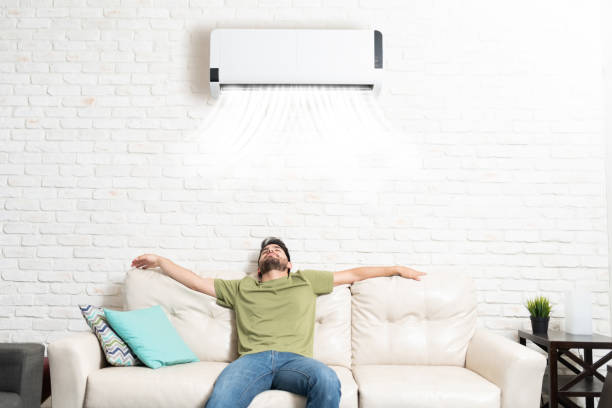 istock Latin Man Relaxing On Sofa At Home 1213583689