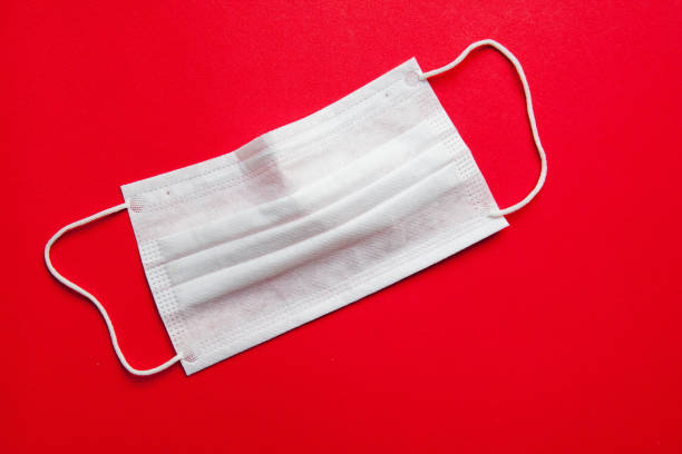 Chinese flag with disposable mask for protection from bacteria and viruses