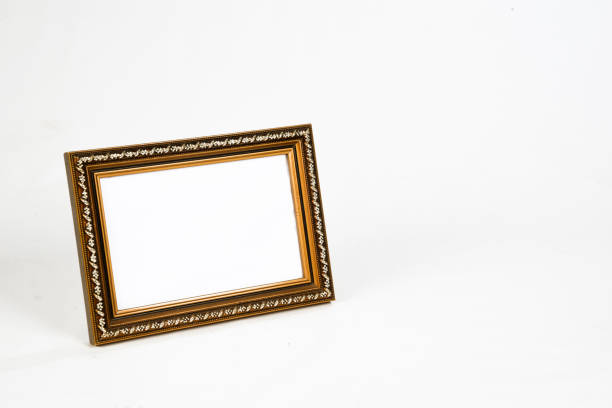 istock carved wooden picture frame the white background. 1213585802