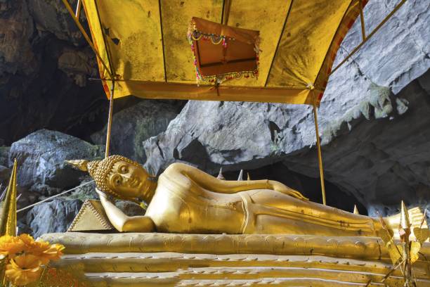 istock Reclining Buddha in Tham Phu Kham Cave, Vang Vieng Laos 1213586563