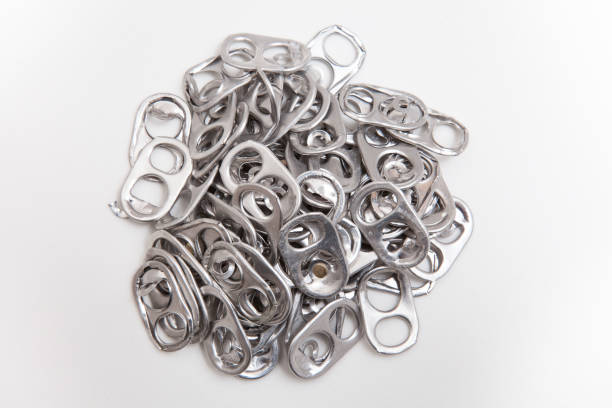 istock aluminum seals from beer can on a white background, recyclable material 1213586728