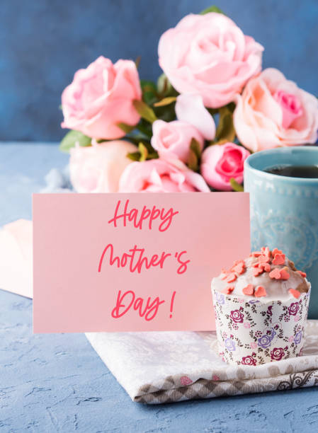 Mother's day greetings with muffin, cup tea Happy mothers day greetings. Holiday greeting card with lettering text, cup of tea and cupcake Mother's Day stock pictures, royalty-free photos & images
