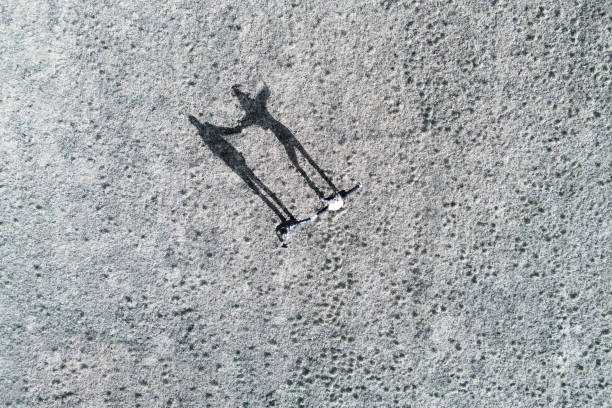 istock Couple shadow from the top, drone shot 1213589874