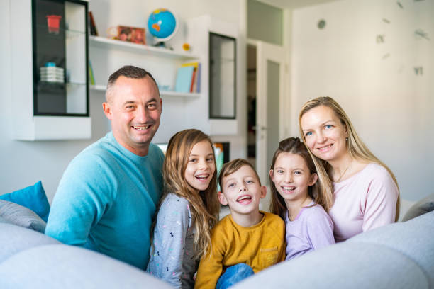 istock Happy family at home 1213591187