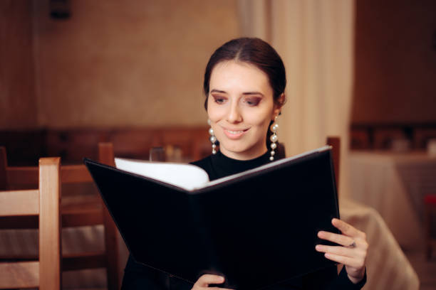 istock Woman Thinking What to Order from Food Menu 1213593054
