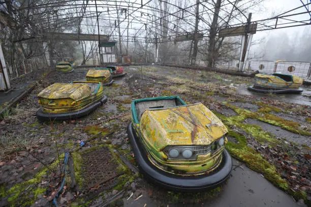 Amusement park in abandoned ghost town Pripyat, post apocalyptic city, spring season in Chernobyl exclusion zone, Ukraine