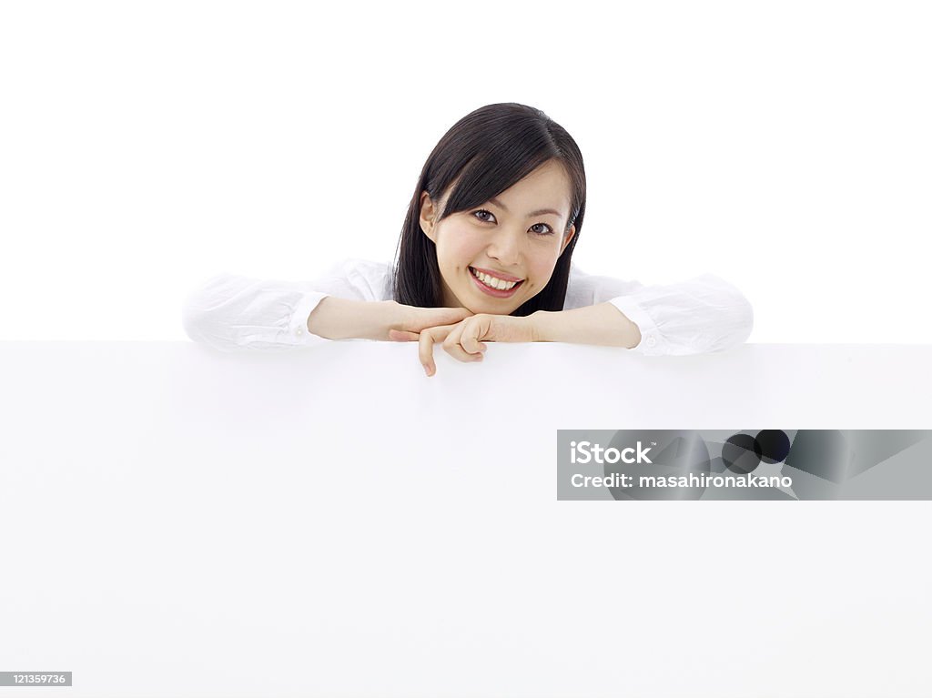 Woman holding a billboard  20-29 Years Stock Photo