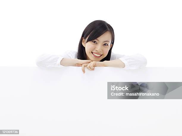 Woman Holding A Billboard Stock Photo - Download Image Now - 20-29 Years, Adult, Adults Only