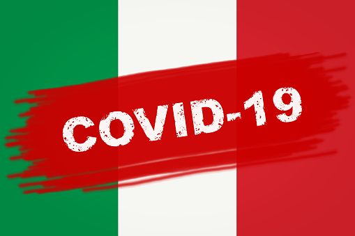 COVID-19 coronavirus epidemic in Italy, banner with inscription COVID19 on Italian flag. Deadly corona virus outbreak in Europe. COVID disease, pandemic and coronavirus warning concept.