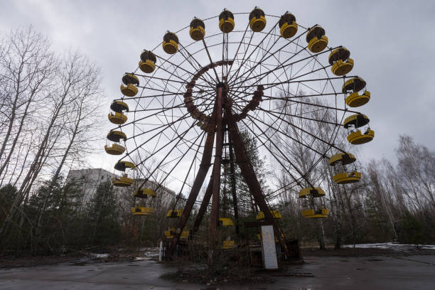 istock Ferris wheel in abandoned amusement park ghost town Pripyat 1213597534