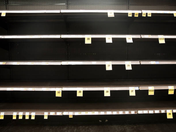 istock Empty shelves  at the grocery store / supermarket. 1213602639