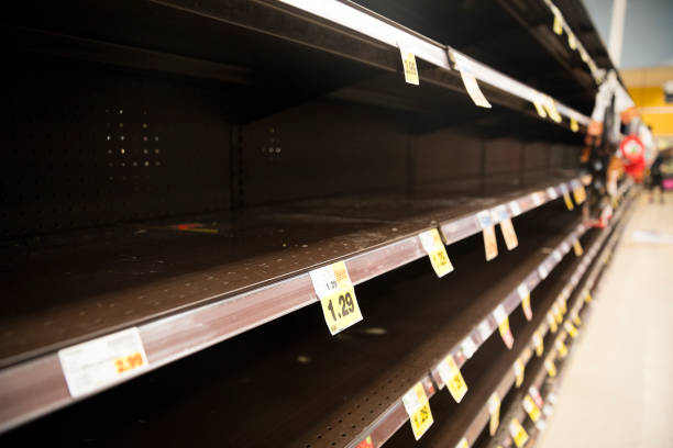 istock Empty shelves  at the grocery store / supermarket. 1213603593