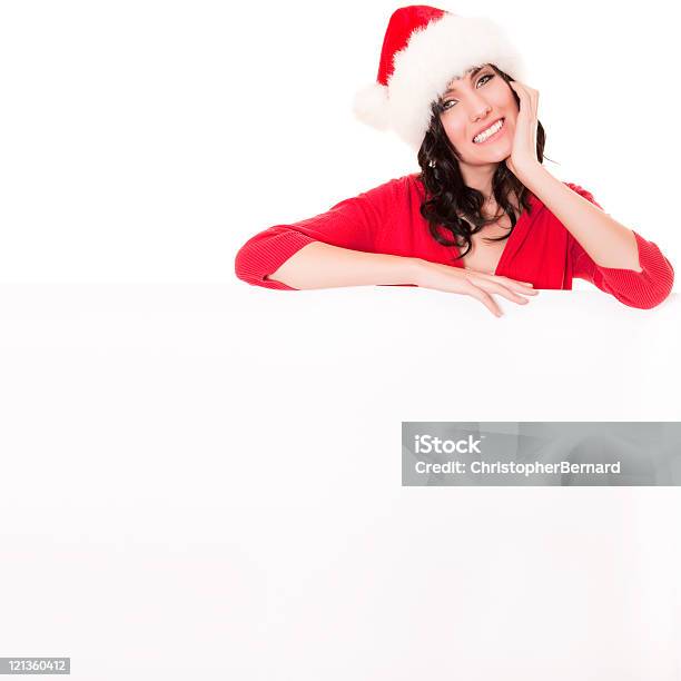 Natal Menina Segurando Um Cartão Em Branco - Fotografias de stock e mais imagens de 16-17 Anos - 16-17 Anos, Adolescente, Afixar Cartaz
