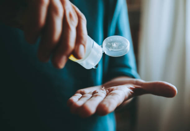 istock Washing Hand with Alcohol Sanitizer 1213606161