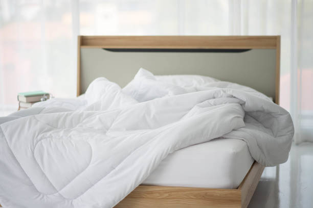 istock Empty bedroom with clock in the morning time 1213606438
