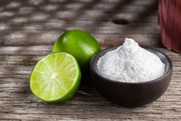 istock Baking soda and lemon on wooden background space for text 1213611319