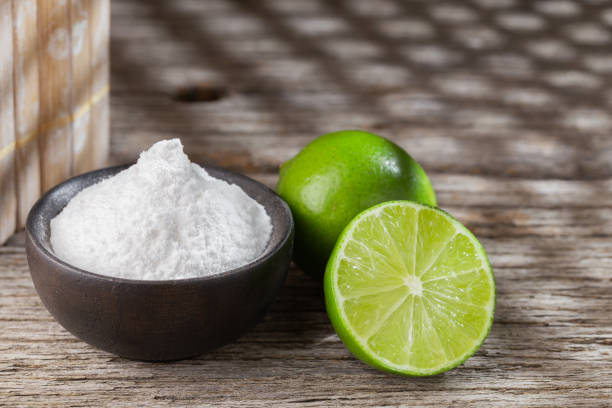 istock Baking soda and lemon on wooden background space for text 1213611448