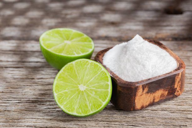 istock Baking soda and lemon on wooden background space for text 1213611587
