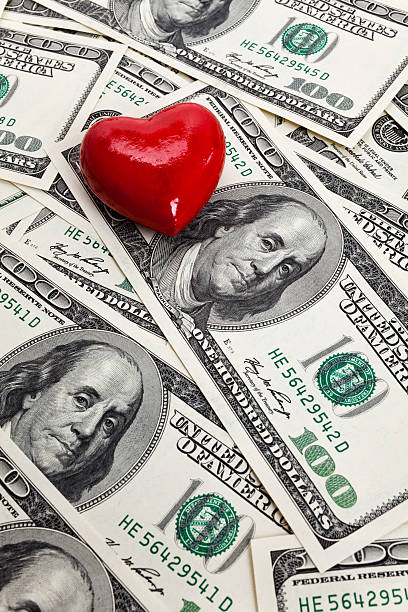 istock Red Heart and Hundred Dollar Bills 121361222