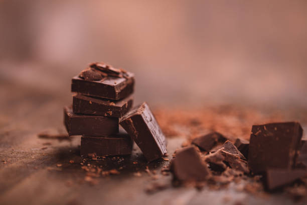 istock Dark chocolate on wooden table 1213612398