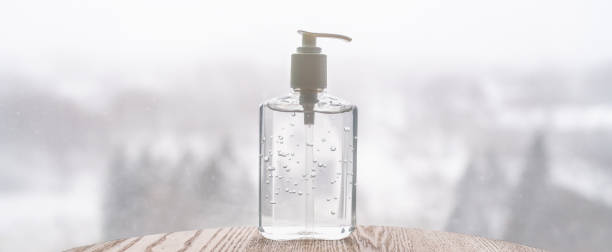 Hand sanitizer bottle on banner header background for COVID-19 Coronavirus concept