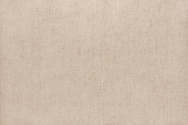 istock Brown cotton fabric texture background, seamless pattern of natural textile. 1213620884