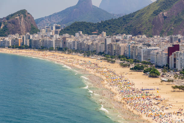 istock Copacabana beach full on a typical sunny Sunday in Rio de Janeiro 1213622663