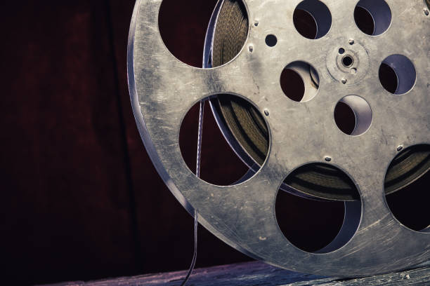 istock 35 mm film reel with dramatic lighting on a dark background 1213623638