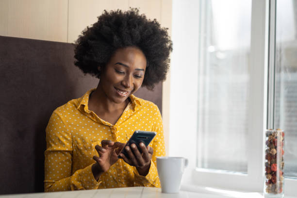 istock Smiling businesswoman using cellphone 1213625166