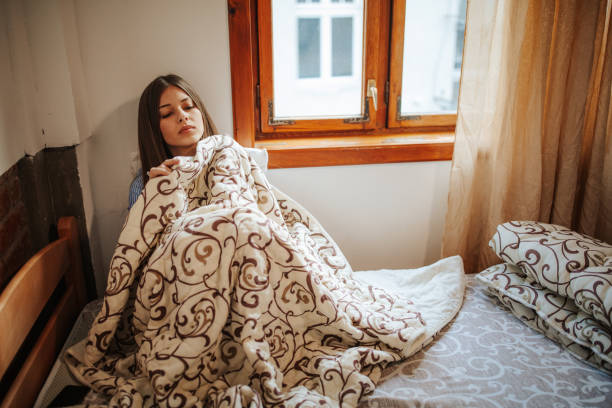 istock Sick woman at home 1213627240