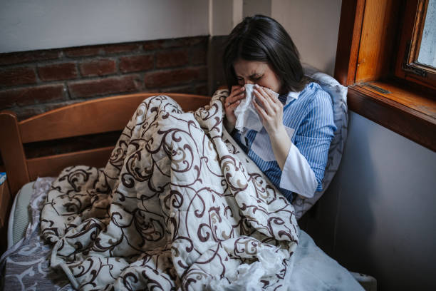 istock Victim of a virus suffering at home 1213627310