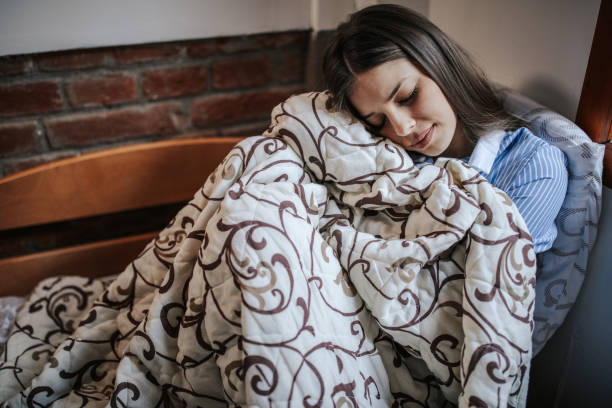 istock Sick woman at home 1213627918