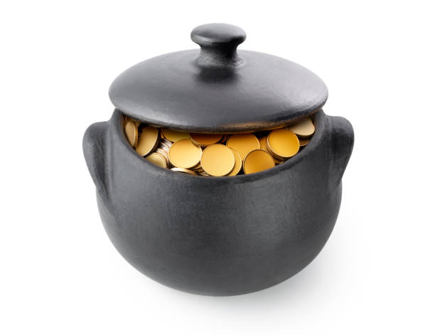 istock Pot full of gold coins 1213628423
