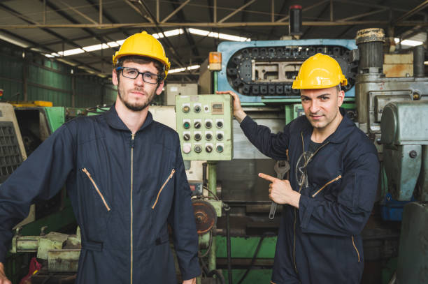 istock Industrial workers are working on projects in large industrial plants with many devices. 1213628472