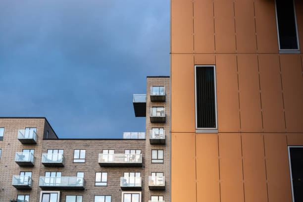 istock Modern Scandinavian architecture from Aarhus Island in Denmark. Buildings that utilizes a lot of window and glass to create gorgous colors 1213628536