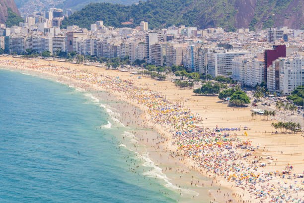 istock Copacabana beach full on a typical sunny Sunday in Rio de Janeiro 1213629692