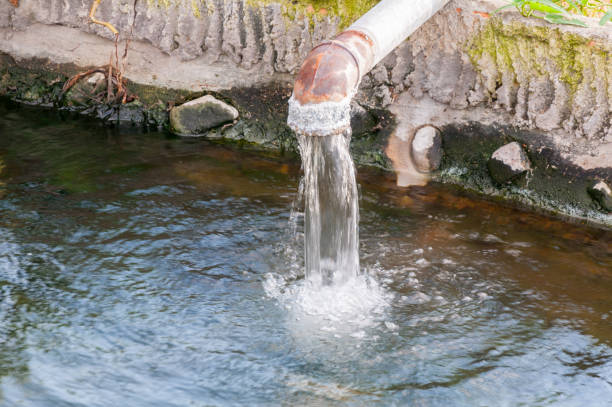 istock Waste pipe or drainage polluting environment,Drain water 1213630891