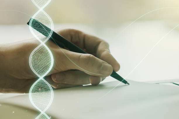 istock Creative light DNA illustration and man hand writing in diary on background, science and biology concept. Multiexposure 1213631831
