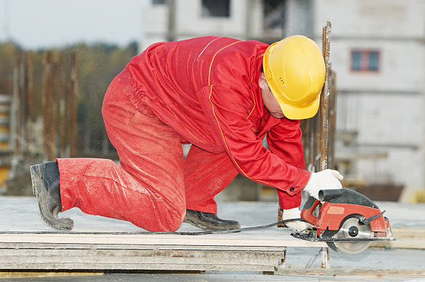 istock cutting construction wood board with grinder saw 121363205