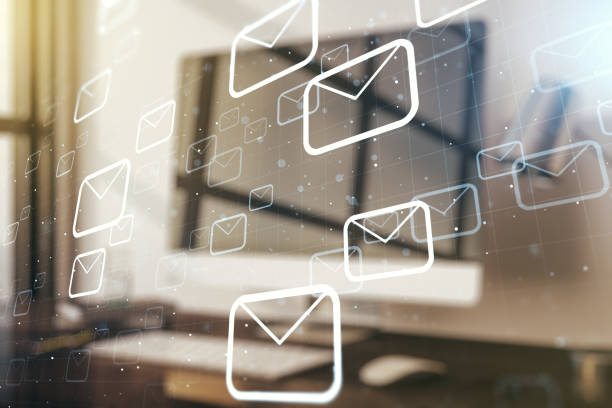 istock Double exposure of postal envelopes hologram on laptop background. Electronic mail and spam concept 1213632283