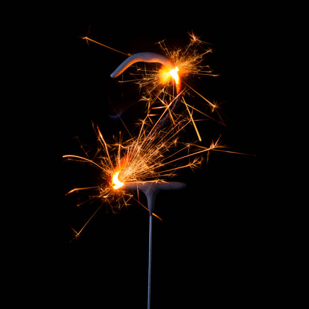 istock Burning sparkler in shape of number two, digit 2, isolated 1213632366