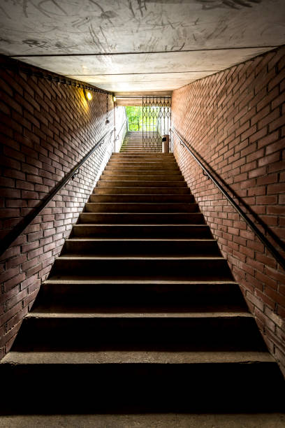 istock Stairway with a railing that rises from the depths 1213633045