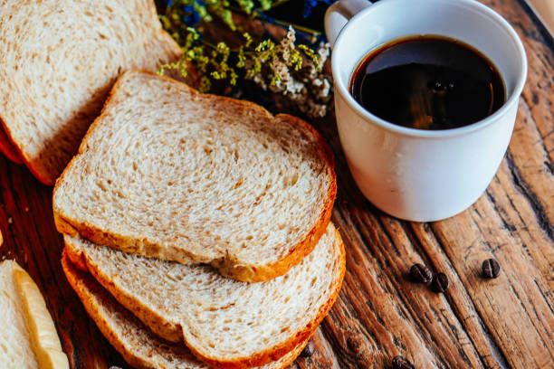 istock Fresh homemade slices bread with coffee cup 1213633469