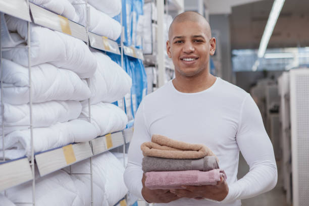 istock Hansome young African man shoppingat home goods store 1213634675