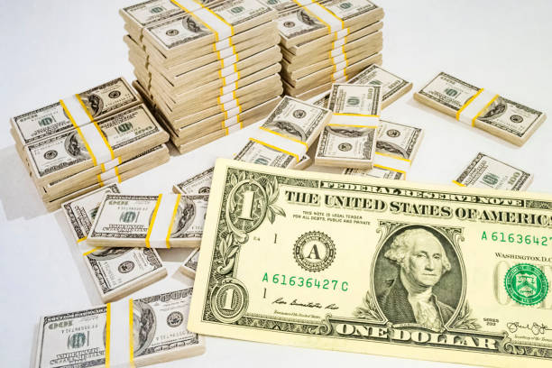 istock close up US dollar banknotes on background. 1213636975